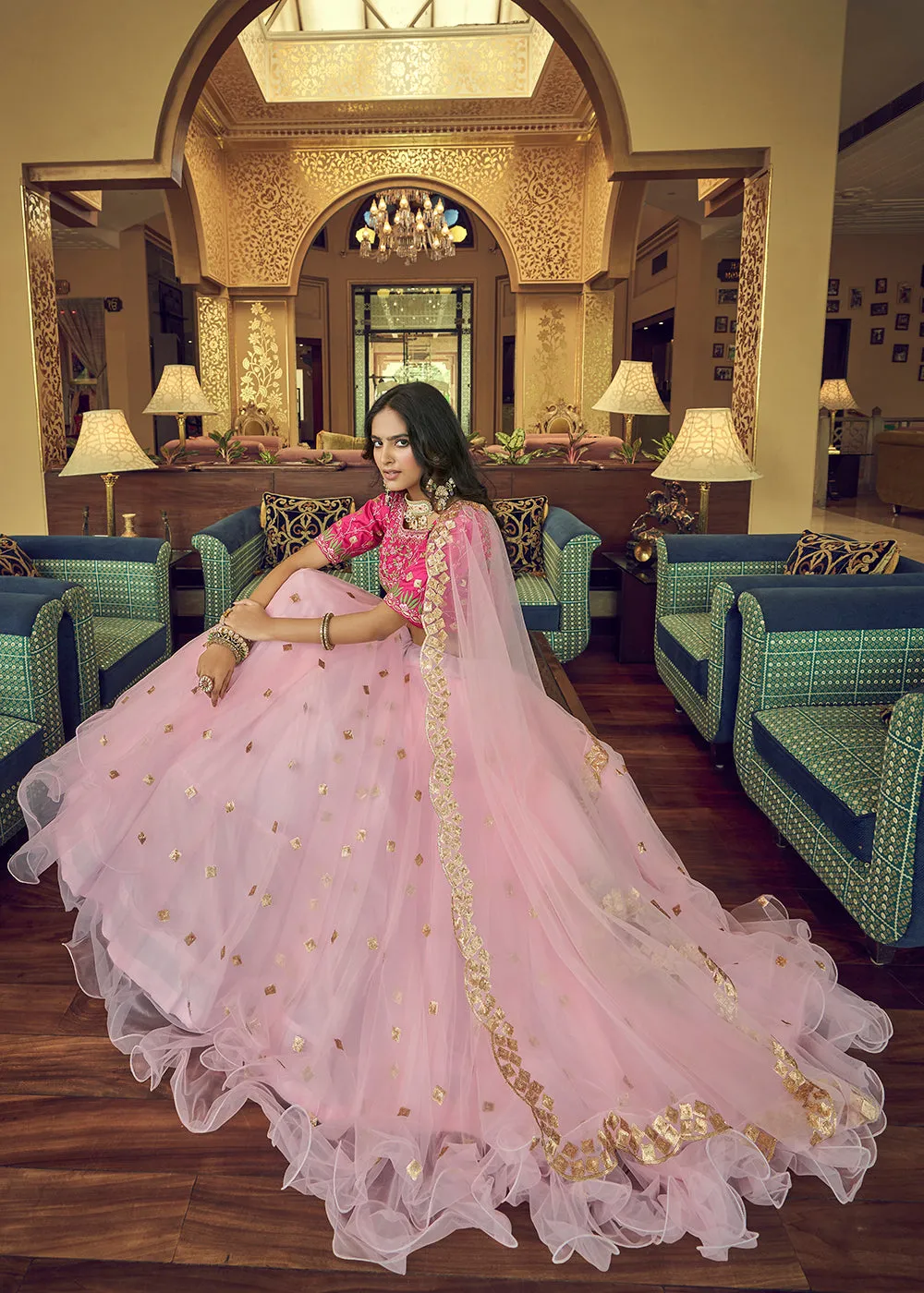 Impressive Baby Pink Heavy Net Party Wear Lehenga Choli