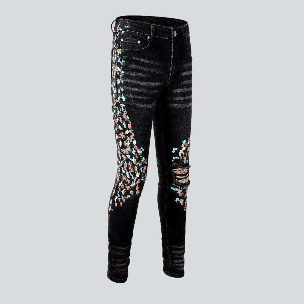 Multicolor stains painted men's jeans