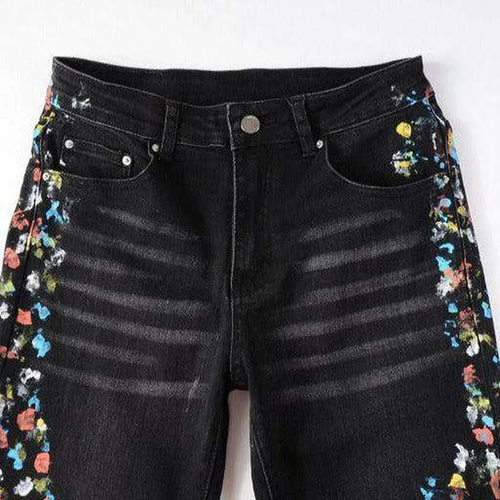 Multicolor stains painted men's jeans